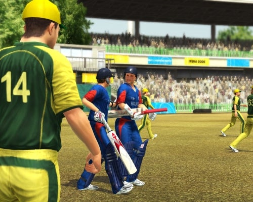 Screenshot from Brian Lara International Cricket 2007 showing a gameplay moment with two batsmen from England on the pitch and an Australian fielder, set in a virtual stadium filled with spectators.