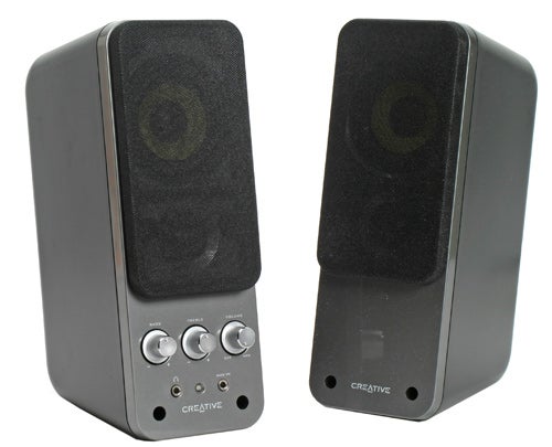 Creative GigaWorks T20 Series II 2.0 Multimedia Speakers with front-panel volume control and three-driver design for midrange clarity on a white background.