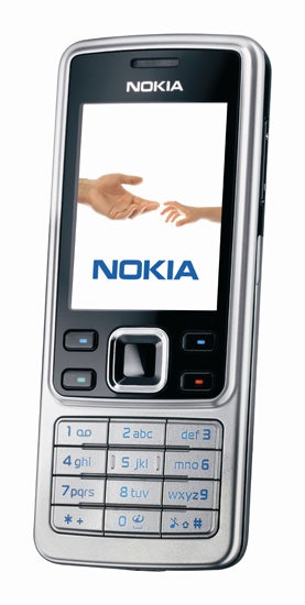 Nokia 6300 mobile phone with a silver body and classic keypad design, displaying the Nokia logo and two animated hands shaking on its screen.