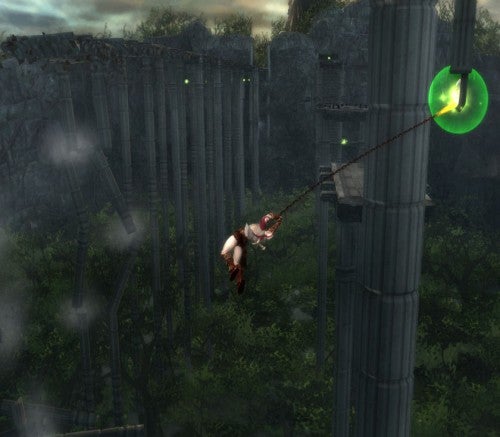 Kratos swinging from a grapple point in God of War 2.