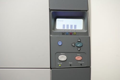 Control panel of the HP Color LaserJet CP4005n printer showing status display with 'Ready' message and toner level indicators, alongside menu navigation buttons.