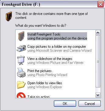 Windows pop-up dialog for Seagate FreeAgent Drive with options to install FreeAgent tools, copy pictures, view a slideshow, print pictures, and open folder to view files.