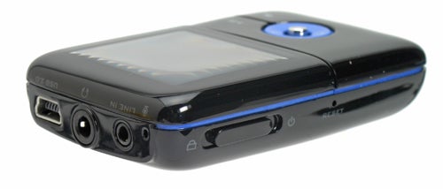 Side view of a black Creative Zen V Plus 8GB portable media player highlighting the display, navigation buttons, and various ports including USB and headphone jacks.