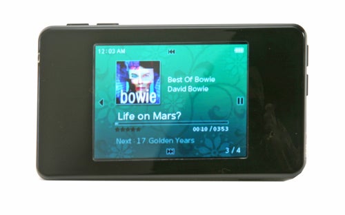 iRiver clix 2 4GB MP3/Media Player displaying David Bowie's 'Life on Mars?' track information on its screen with album art in the background.