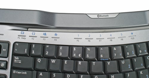 Close-up view of the Microsoft Wireless Entertainment Desktop 7000 keyboard showing the media control keys and the Bluetooth logo.