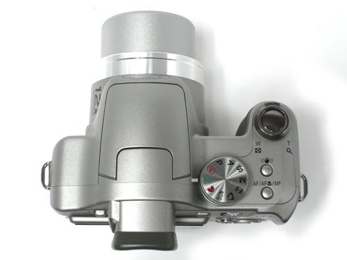 Top view of the Panasonic Lumix DMC-FZ8 camera, showing the silver body, zoom lens, and control dials.