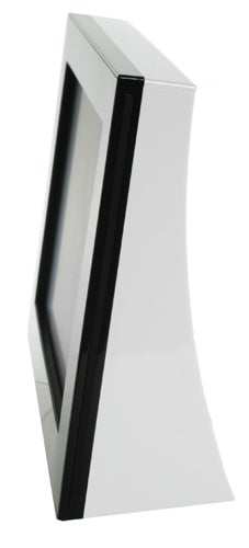 Side view of AG Neovo FotoVivo V10 7in digital photo frame with a sleek white and black design.