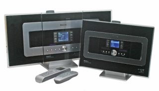 Philips Streamium WACS7000 music center and station with remote controls displayed on a white background.