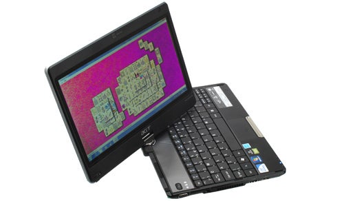 Laptop with a rotated touchscreen displaying colorful thermal imaging software, possibly used for product testing or review.