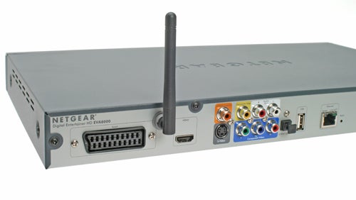 Netgear Digital Entertainer HD EVA8000 media streamer with various connectivity ports and wireless antenna visible.