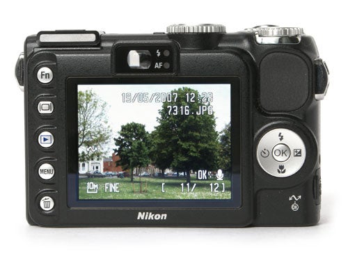 Nikon CoolPix P5000 camera displaying a photo on its LCD screen.