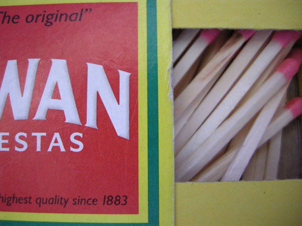 Close-up photo of matches in a box.