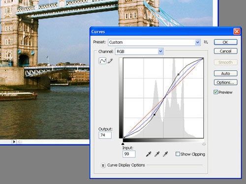 Adobe Photoshop CS3 Curves adjustment dialog box on screen with background photo.