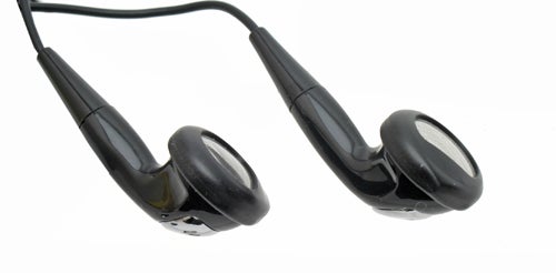 Black in-ear headphones on a white background.