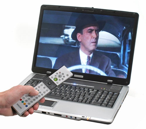 Evesham Zieo N500-HD laptop displaying video with remote control.