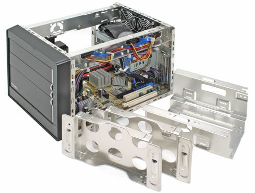 Shuttle SD39P2 Barebone system with open case and components visible.