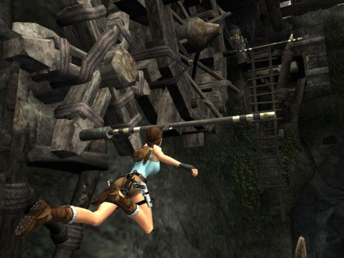 Lara Croft character jumping in Tomb Raider: Anniversary game scene.