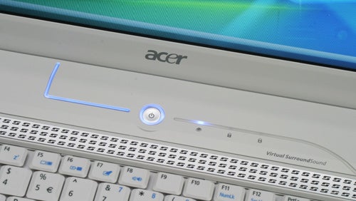 Close-up of Acer Aspire 5920 laptop's keyboard and power button.