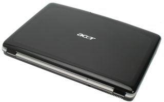 Acer Aspire 5920 laptop closed on white background.