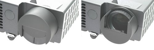 Taxan KG-PS125X projector showing lens and focus mechanism.