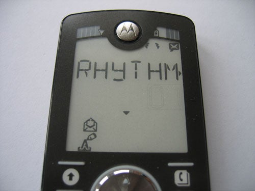 Motorola MOTOFONE F3 with 'RHYTHM' displayed on screen