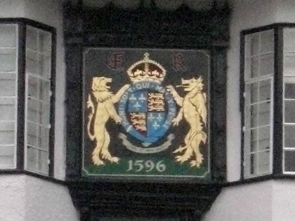 Blurry photo of a crest with the date 1596