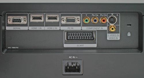 Panasonic PT-AE1000E projector rear input panel with connections.