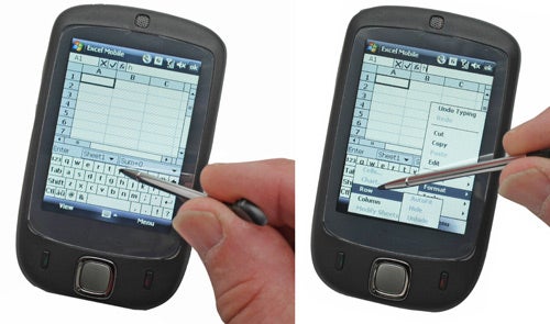 HTC Touch smartphone displaying Excel spreadsheet with stylus.