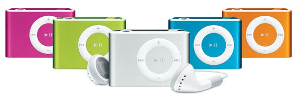 Colorful Apple iPod Shuffle 1GB models with earphones.