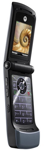 Motorola W510 flip phone open showing screen and keypad.