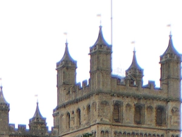 Blurred photo of a building with towers.
