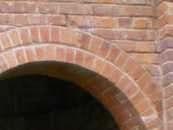 Close-up of brick archway demonstrating camera's detail capture.