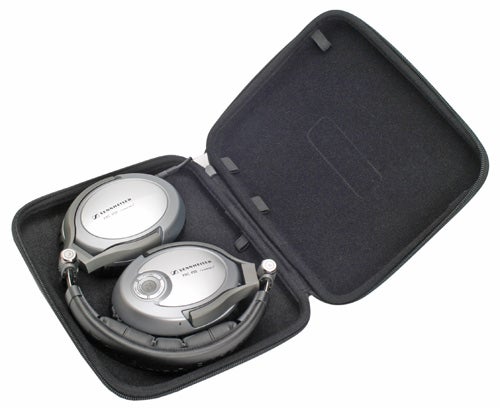 Sennheiser PXC 450 headphones in carrying case.