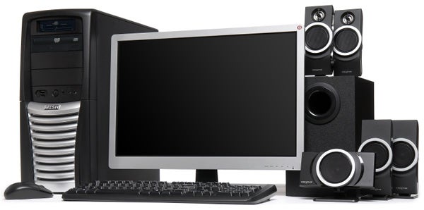 Mesh Elite Quad Express-SP computer with monitor and speakers.