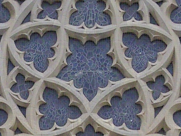 Detailed stone carving with intricate gothic patterns.