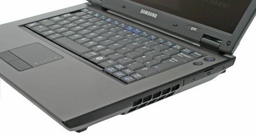 Samsung laptop with keyboard visible and screen partially open.