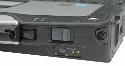 Close-up of Panasonic ToughBook CF-30 power and wireless switches.