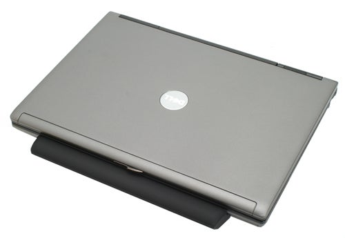 Dell Latitude D630 laptop closed on white background.