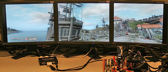 Matrox TripleHead2Go with three monitors displaying a game.