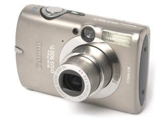 Canon Digital IXUS 900 Ti camera on a white background.