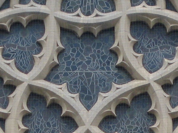 Close-up of intricate stone window tracery.
