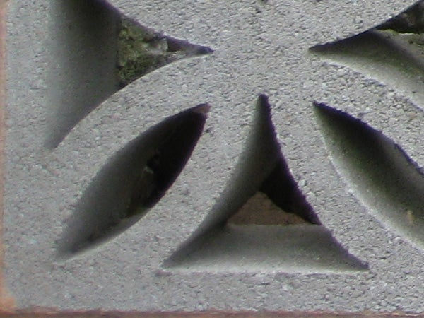 Close-up of textured surface with geometric shapes.