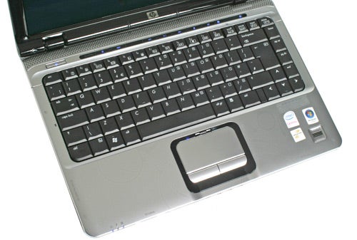 HP Pavilion dv2560ea laptop keyboard and trackpad close-up.