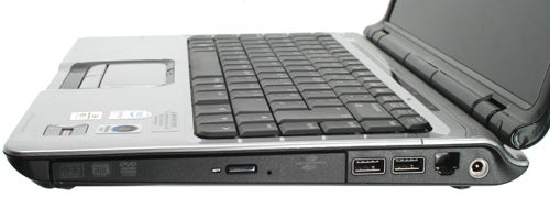 HP Pavilion dv2560ea laptop side view showing ports and keyboard.