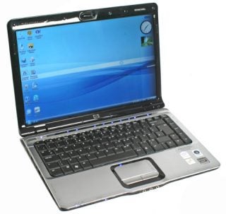 HP Pavilion dv2560ea laptop with open lid displaying screen.