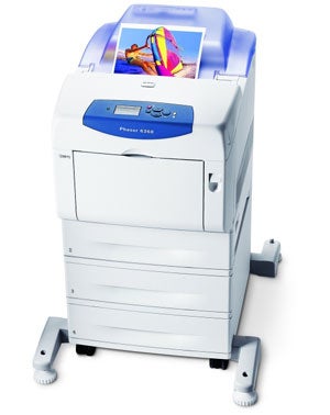 Xerox Phaser 6360VN colour laser printer with printed sheets.