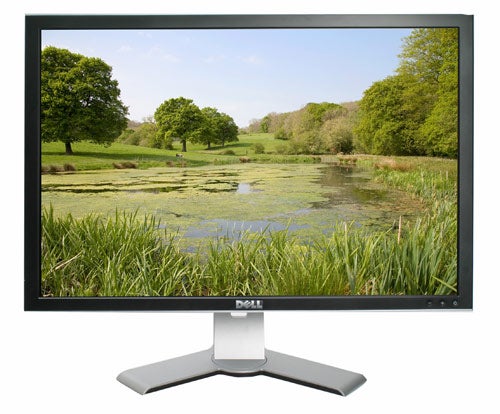 Dell UltraSharp 3007WFP-HC 30-inch monitor displaying landscape image.