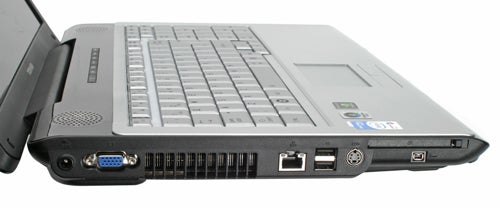 Toshiba Satellite P200-143 laptop showing ports and keyboard.