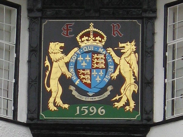 Coat of arms on a building plaque with a date 1596.