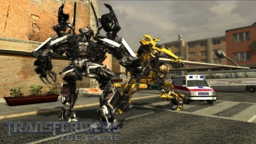 Screenshot of Transformers: The Game showing two robots and police car.
